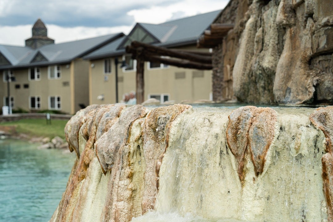 Hot springs cascading over rocks at The Springs Resort in Pagosa Springs, CO.