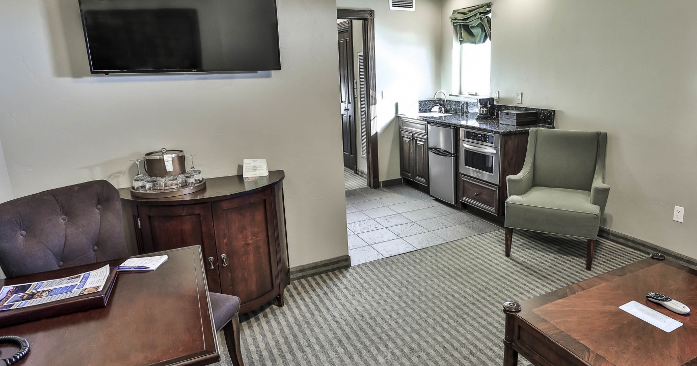 The Living room area in the Lux King Suite