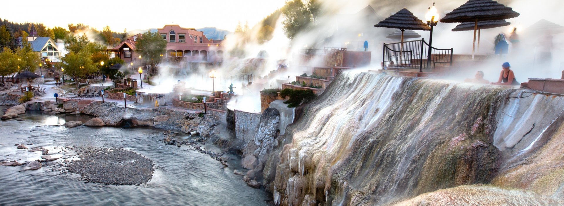 A couple soaking on the hot spring pool and checking the view of the outdoors