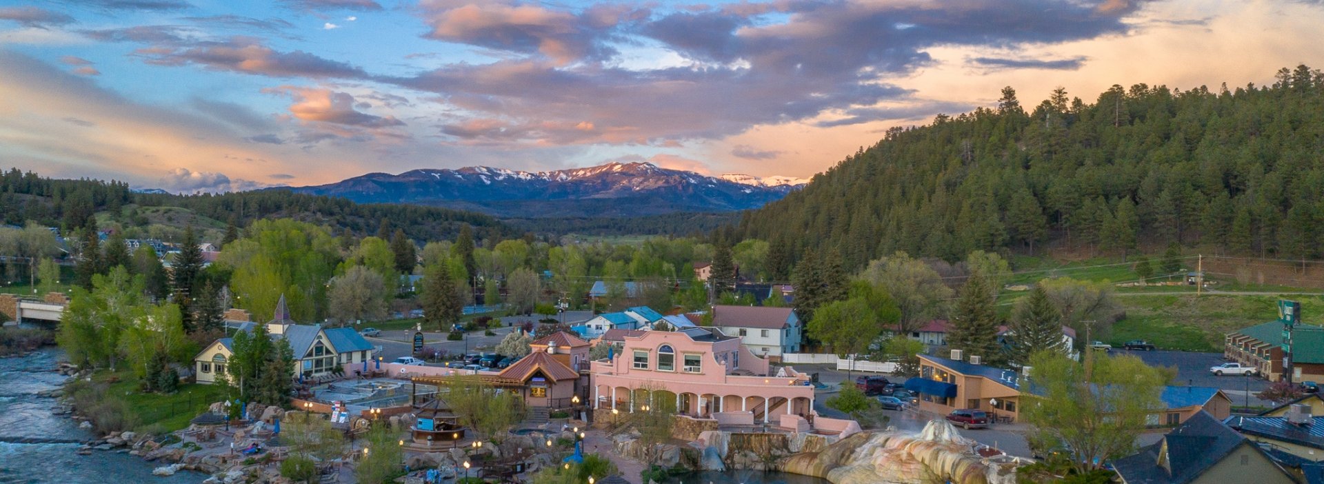 An aerial view of The Springs Resort at sunset