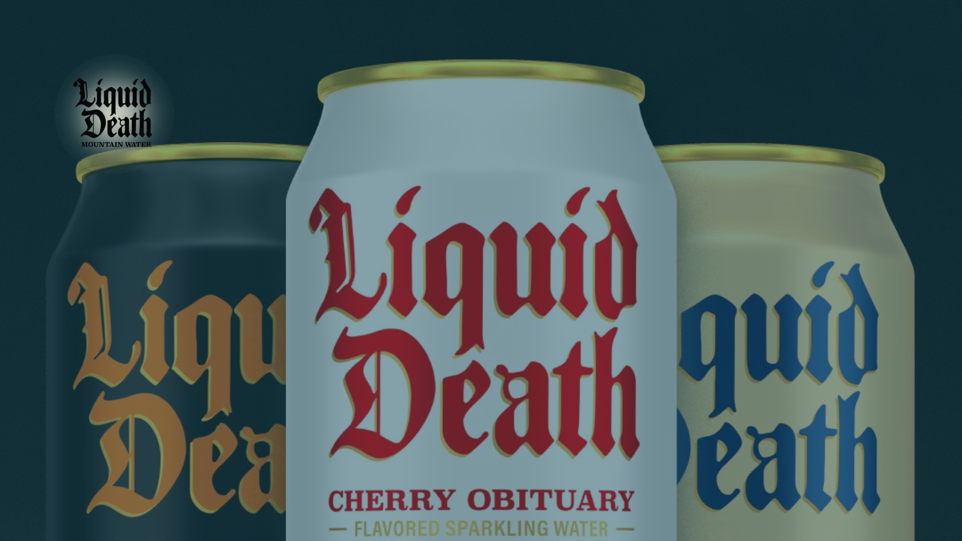 Three beverage cans, dark blue, white, and cream, are angled in a row against a dark background. The white can shows 
