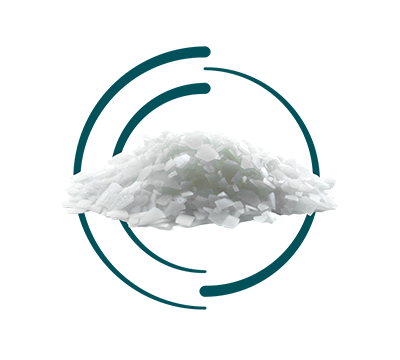 A pile of white, irregular flakes is centered, partially encircled by a dark teal segmented ring design on a white background.