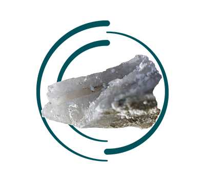 A white, crystalline mineral specimen with a rough base is centrally displayed. It's partially encircled by incomplete dark teal rings and a short line on a white background.