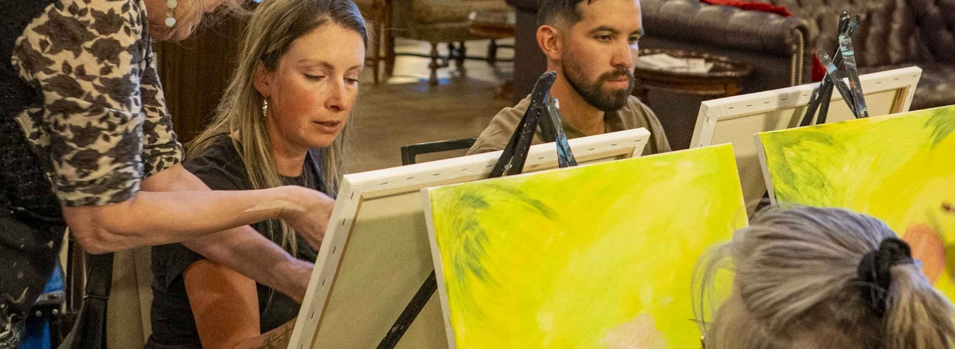 Guests participating in a painting class at The Springs Resort in Pagosa Springs, Colorado.
